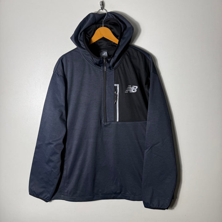 NEW BALANCE HALF ZIP WINDBREAKER HOODIE