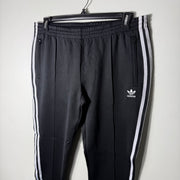 ADIDAS ORIGINALS WOMEN SPORT TROUSER WITH SIDE ZIP POCKETS BLACK COLOUR