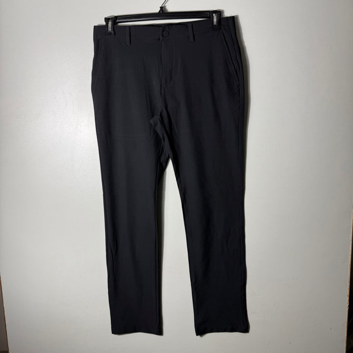 GREG NORMAN PERFORMANCE WITH STRETCH BRAND NEW BLACK COLOUR