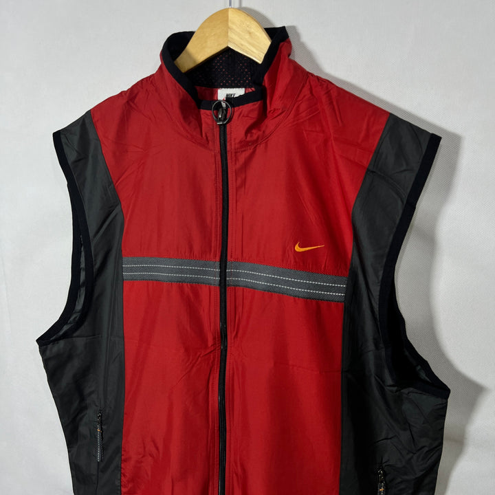 NIKE PARACHUTE SLEEVES LESS JACKET