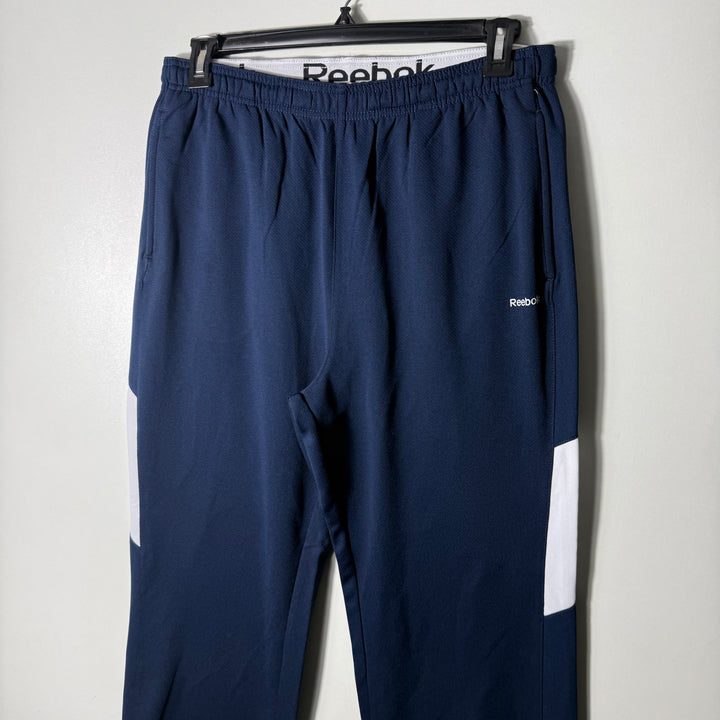 REEBOK LOOSE FIT SPORT TROUSER BLUE COLOUR