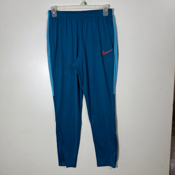 NIKE DRI FIT SPORT TROUSER WITH SIDE ZIP POCKETS