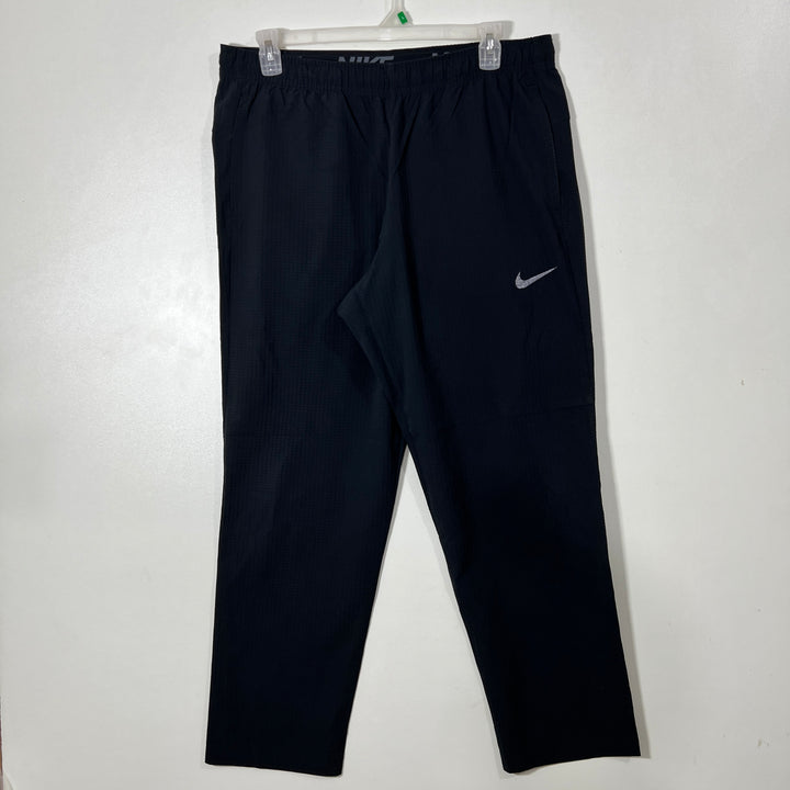 NIKE DRI FIT STRAIGHT FIT PARACHUTE TROUSER