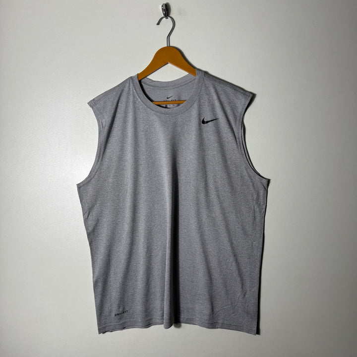 NIKE DRI FIT SPORT SLEEVES LESS GREY COLOUR