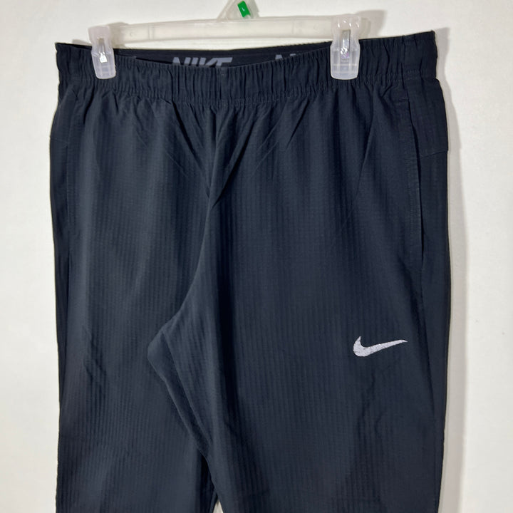 NIKE DRI FIT STRAIGHT FIT PARACHUTE TROUSER