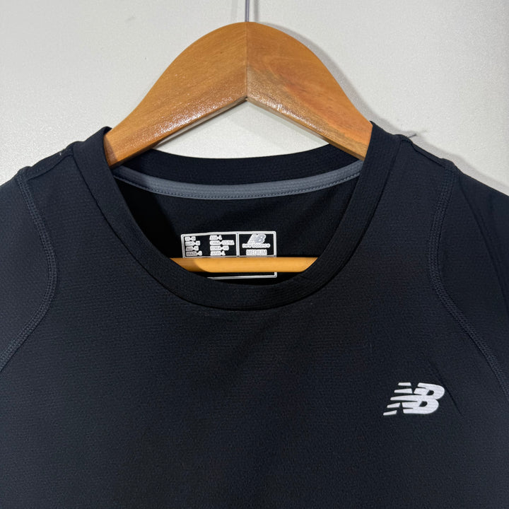 NEW BALANCE SPORT SLEEVES LESS BLACK COLOUR