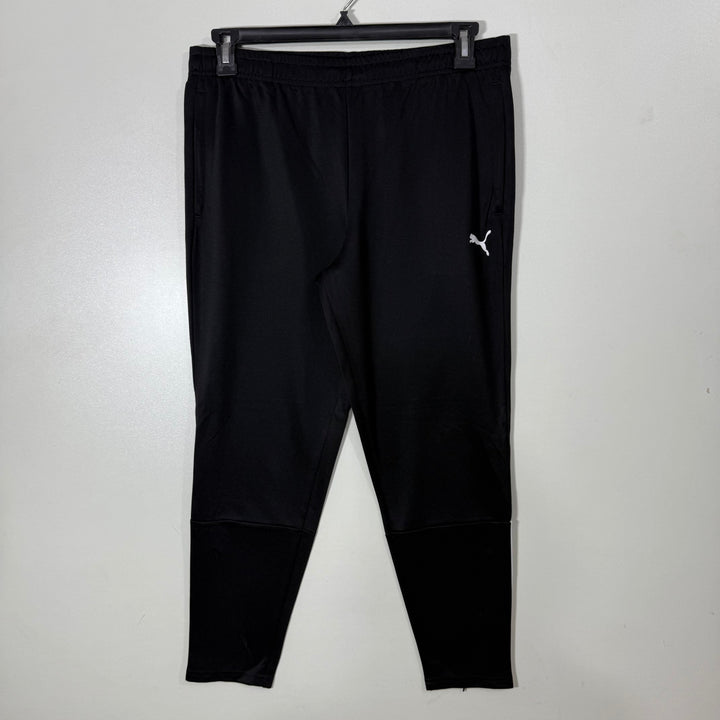 PUMA SKINNY FIT SPORT TROUSER WITH SIDE ZIP POCKETS BLACK COLOUR