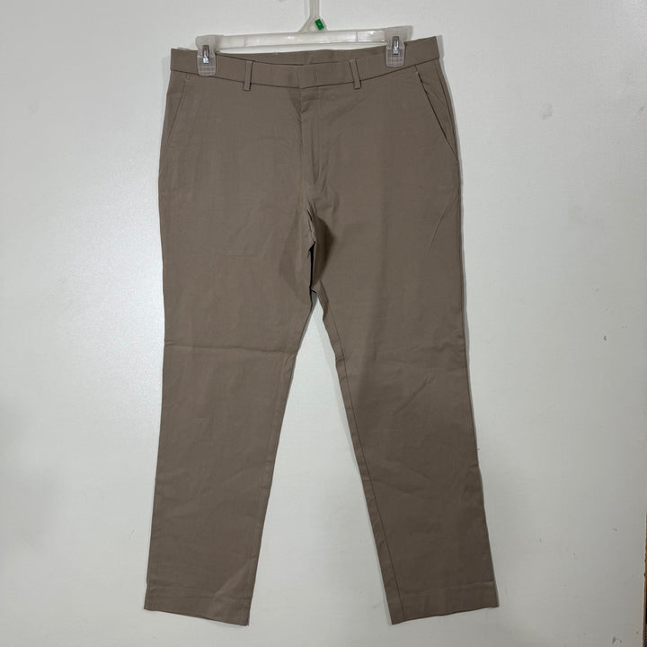 TOMMY HILFIGER THFLEX STRETCH FABRIC SUPER STRETCH WAISTBAND MACHINE WASHABLE WRINKLE RESISTANT PERFORMANCE DRESS PANT BRAND NEW WITH STRETCH