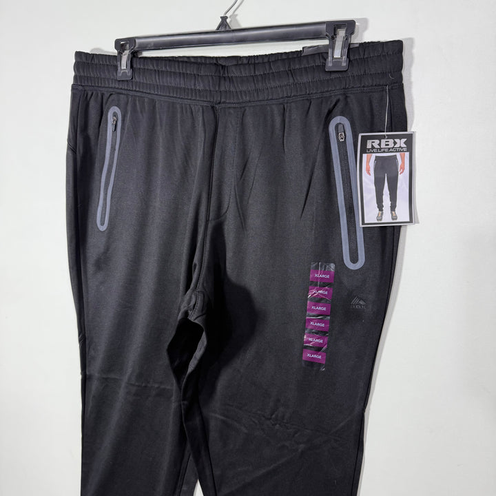 RBX ACTIVE WICKING FLEXIBILITY FOR COMFORT AND PERFORMANCE WICKING DRYING SPORT TROUSER BRAND NEW INNER FLEECE WITH SIDE ZIP POCKETS BLACK COLOUR