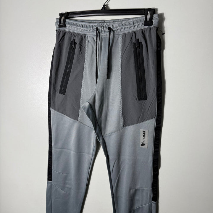 NIKE AIR MAX SPORT TROUSER WITH SIDE ZIP POCKETS GREY COLOUR