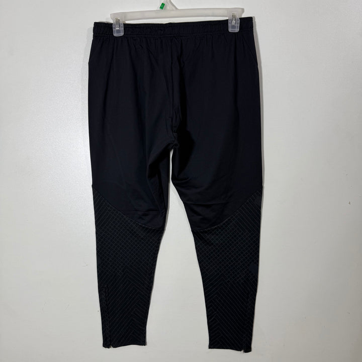 NIKE DRI FIT SPORT TROUSER WITH SIDE ZIP POCKETS