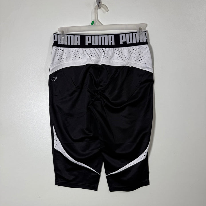 PUMA THREE QUARTER SPORT SHORT WITH SIDE ZIP POCKETS BLACK COLOUR