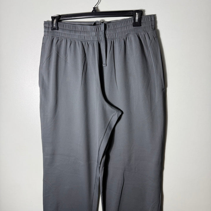 UNDER ARMOUR LOOSE FIT SPORT TROUSER GREY COLOUR