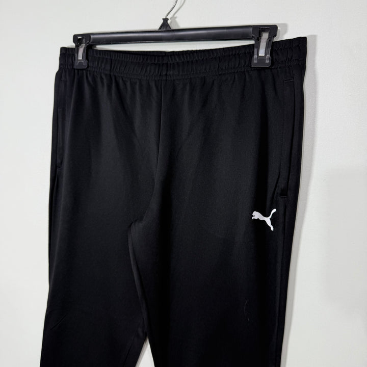PUMA SKINNY FIT SPORT TROUSER WITH SIDE ZIP POCKETS BLACK COLOUR