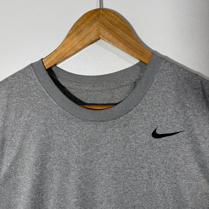 NIKE DRI FIT SPORT SLEEVES LESS GREY COLOUR