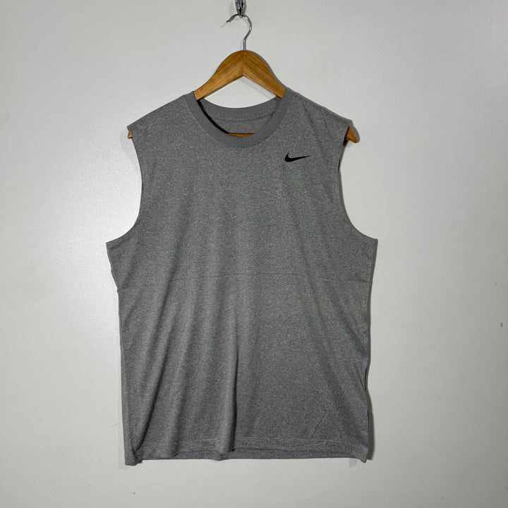 NIKE DRI FIT SPORT SLEEVES LESS GREY COLOUR