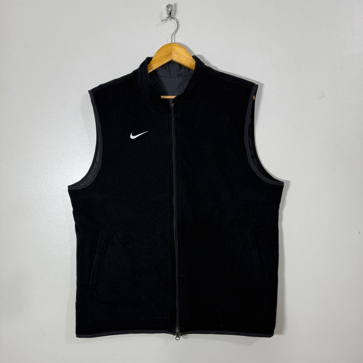 NIKE REVERSIBLE ONE SIDE FLEECE ONE SIDE QUILTED SLEEVES LESS PUFFER JACKET