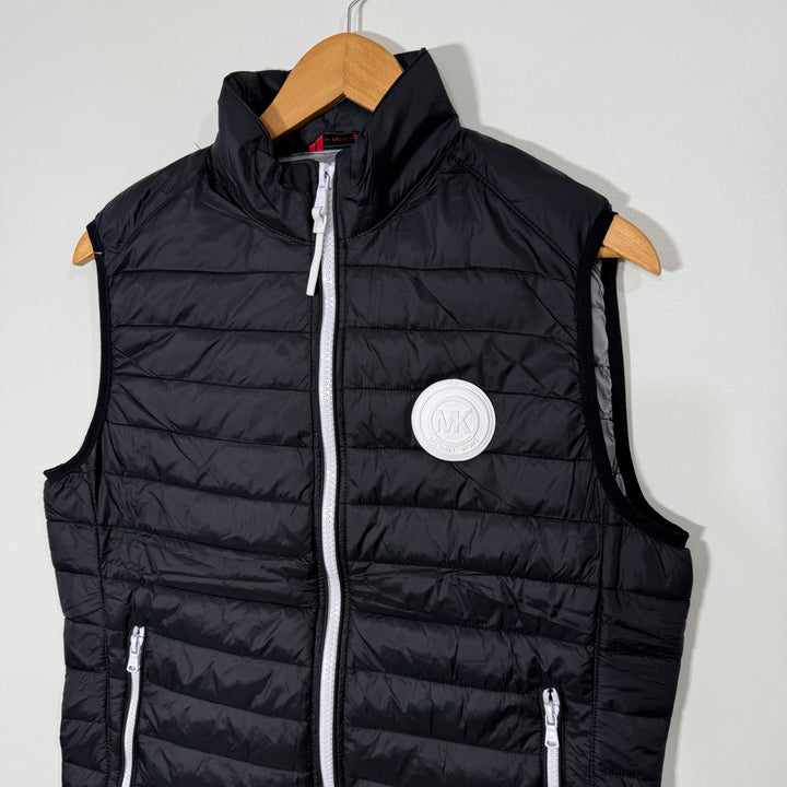 MICHAEL KORS TRAVEL ENGINEERED WATER RESISTANT WIND PROOF COLD RESISTANT COMPACT INSULATION SUSTAINABLE INSULATION SLEEVES LESS PUFFER JACKET