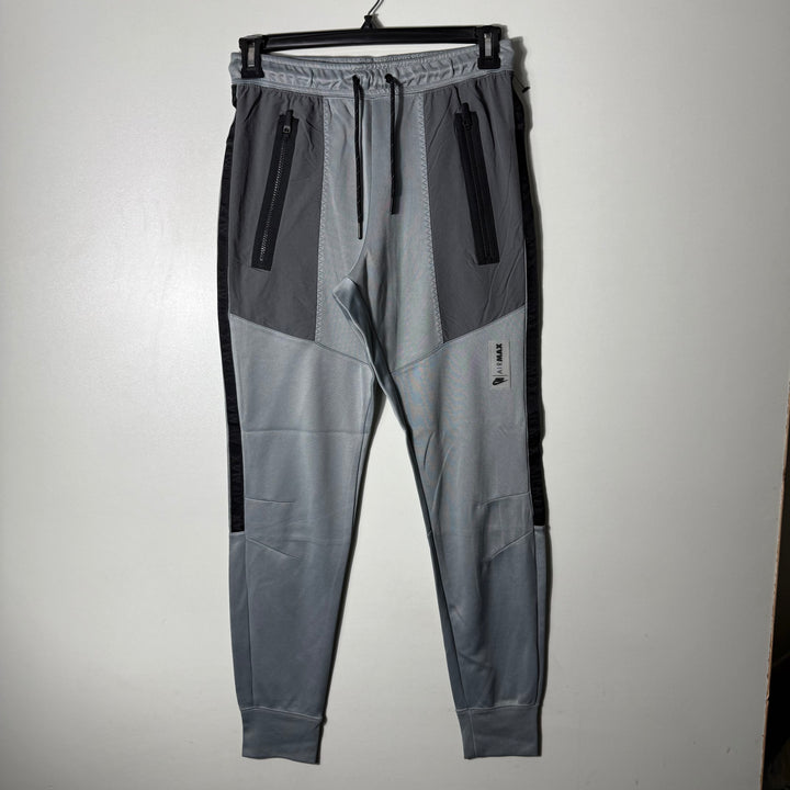 NIKE AIR MAX SPORT TROUSER WITH SIDE ZIP POCKETS GREY COLOUR