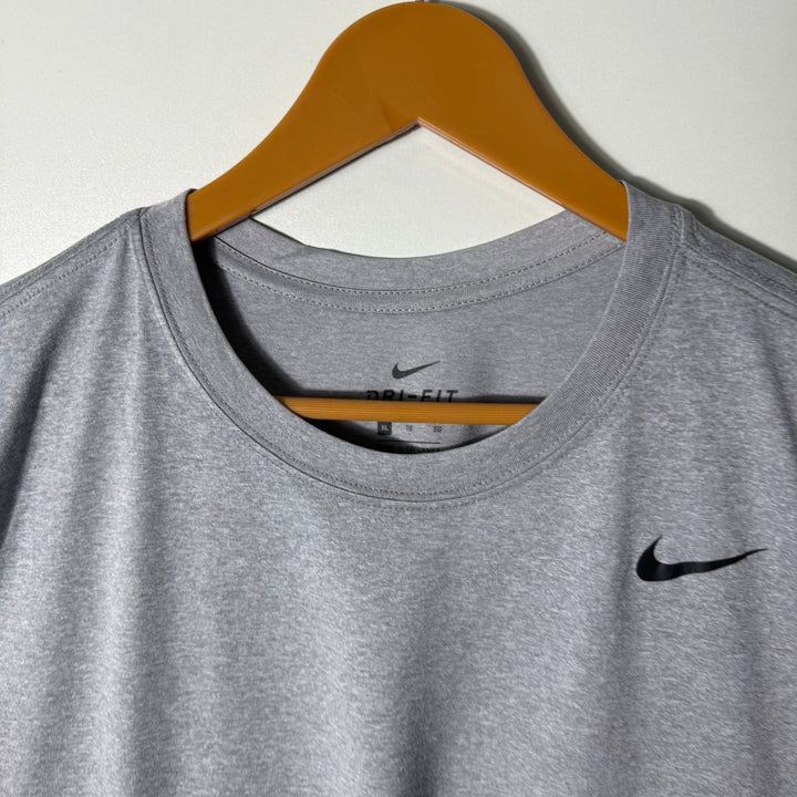 NIKE DRI FIT SPORT SLEEVES LESS GREY COLOUR