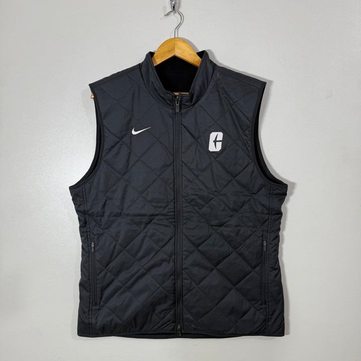NIKE REVERSIBLE ONE SIDE FLEECE ONE SIDE QUILTED SLEEVES LESS PUFFER JACKET