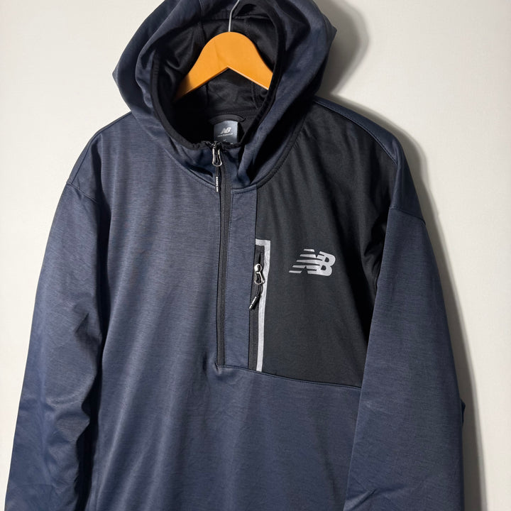 NEW BALANCE HALF ZIP WINDBREAKER HOODIE