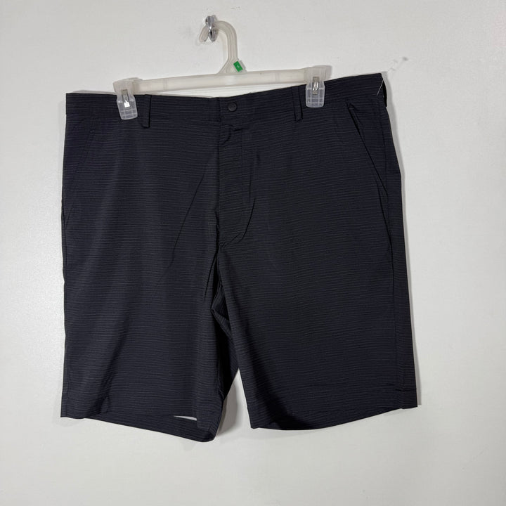 GREG NORMAN PERFORMANCE GOLF SHORT BRAND NEW WITH STRETCH GREY COLOUR