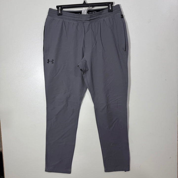 UNDER ARMOUR HYBRID PERFORMANCE PARACHUTE SPORT TROUSER WITH SIDE BACK ZIP POCKETS GREY COLOUR