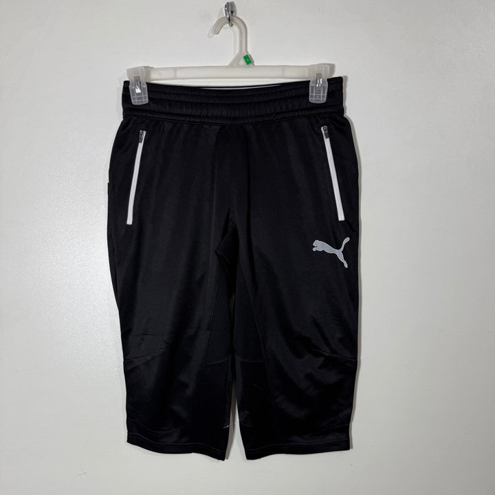 PUMA THREE QUARTER SPORT SHORT WITH SIDE ZIP POCKETS BLACK COLOUR