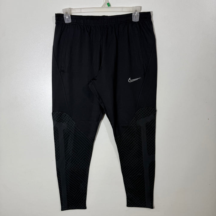 NIKE DRI FIT SPORT TROUSER WITH SIDE ZIP POCKETS