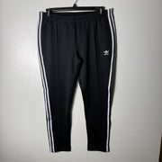 ADIDAS ORIGINALS WOMEN SPORT TROUSER WITH SIDE ZIP POCKETS BLACK COLOUR