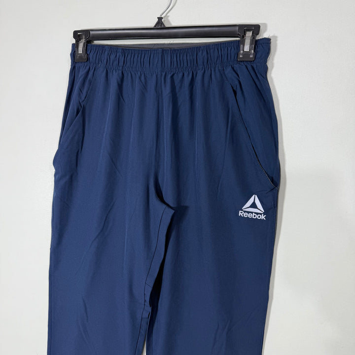 REEBOK LOOSE FIT HYBRID PARACHUTE SPORT TROUSER BLUE COLOUR