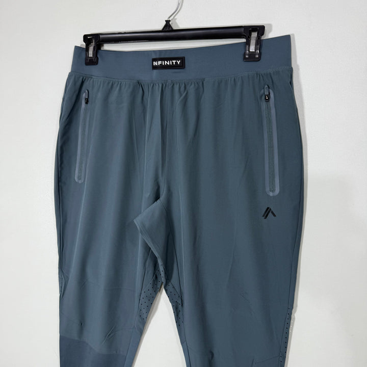 INFINITY HYBRID PARACHUTE SPORT TROUSER WITH SIDE ZIP POCKETS GREY COLOUR