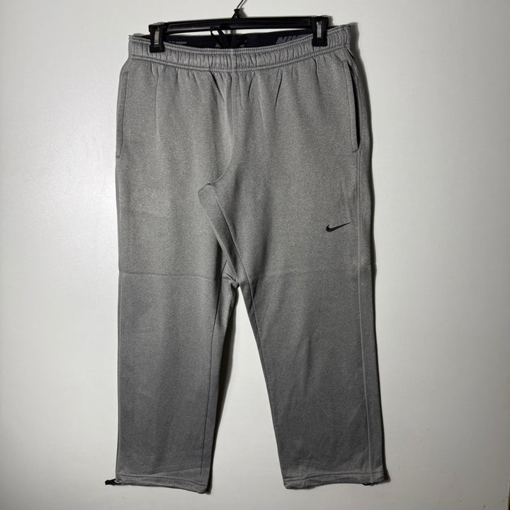 NIKE THERMA FIT SPORT TROUSER LOOSE FIT INNER FLEECE GREY COLOUR